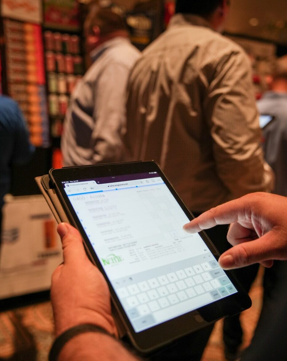 person using tablet at event